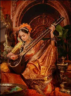 Painting of a Banarasi musician with a sitar, surrounded by marigolds