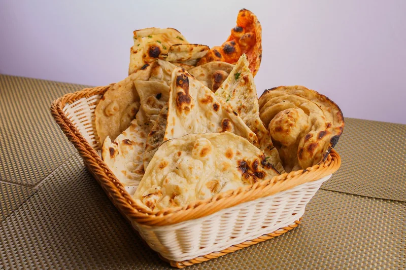 Assorted naan fresh from the tandoor