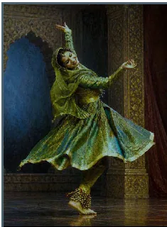 Painting of a Kathak dancer mid-spin in a green and gold costume